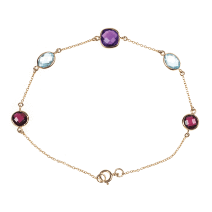 Gold bracelet with colored gemstones: purple amethyst, red rodolite and blue topaz.