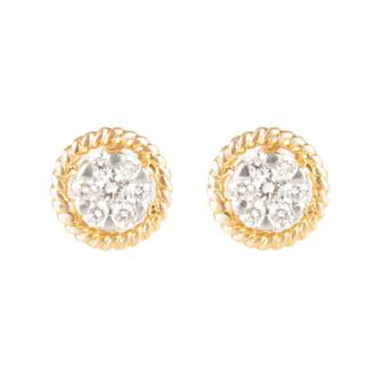 Gold earrings with diamonds on a light background.