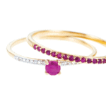 Gold rings with diamonds and rubies set of two rings on white background