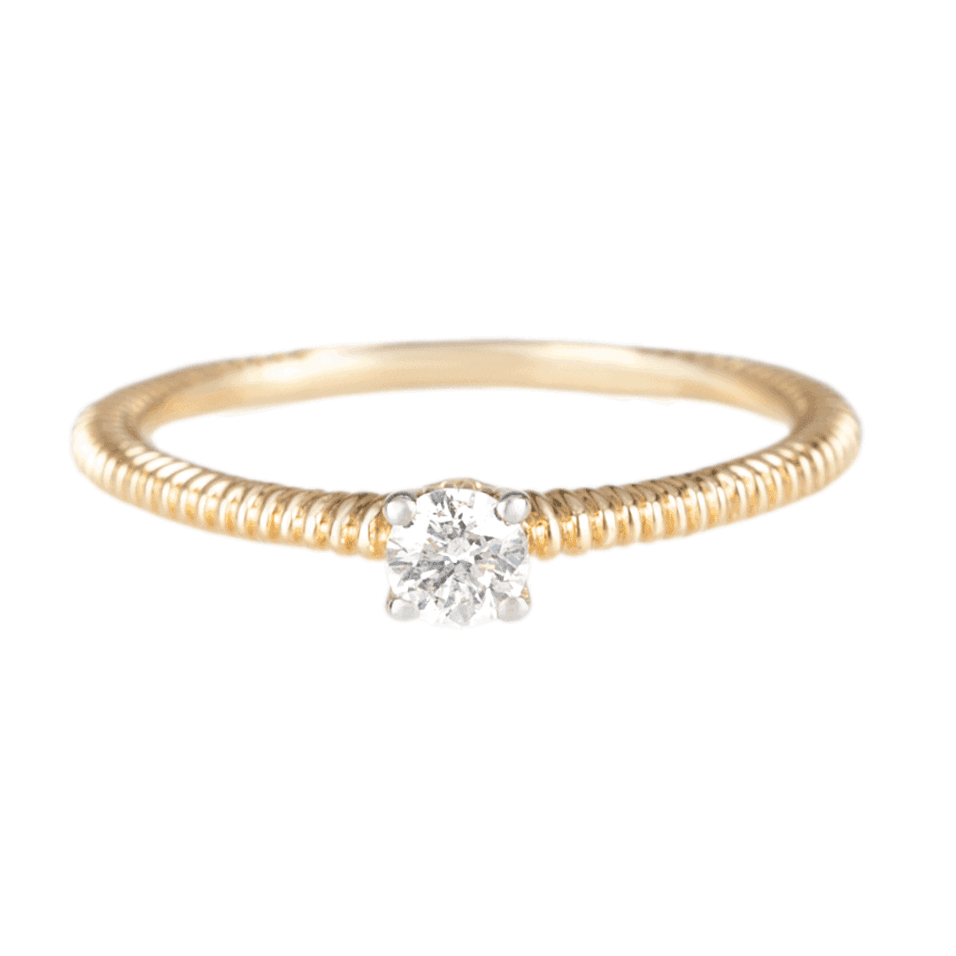 Gold ring with diamond on white background