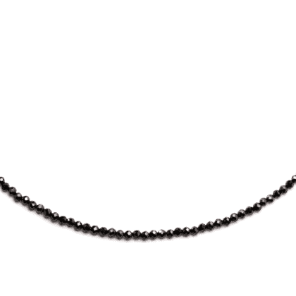 Black gemstones necklace from tourmaline on white background