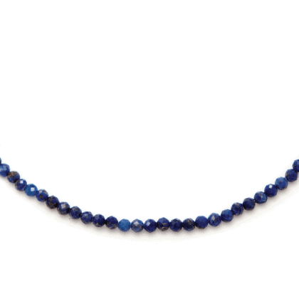 Gemstones necklace from lapis lazuli on white background