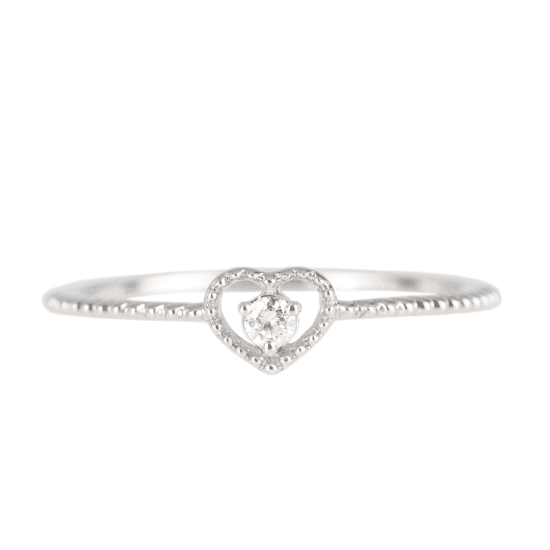 White gold diamond ring heart shaped on white background