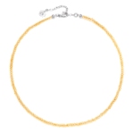 Żółty naszyjnik z kamieni cytrynów na jasnym tle.