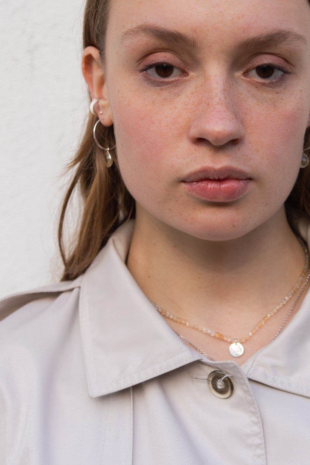 Yellow citrine necklace with personalized pendant on model
