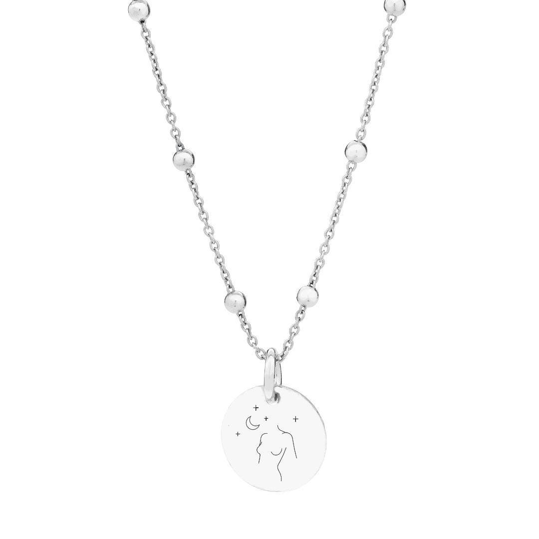 Necklace with a silver pendant and engraving of women and astrological symbols.