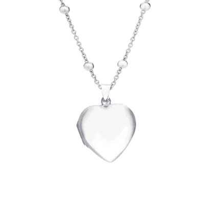 Silver heart locket with an engraving on a delicate chain.