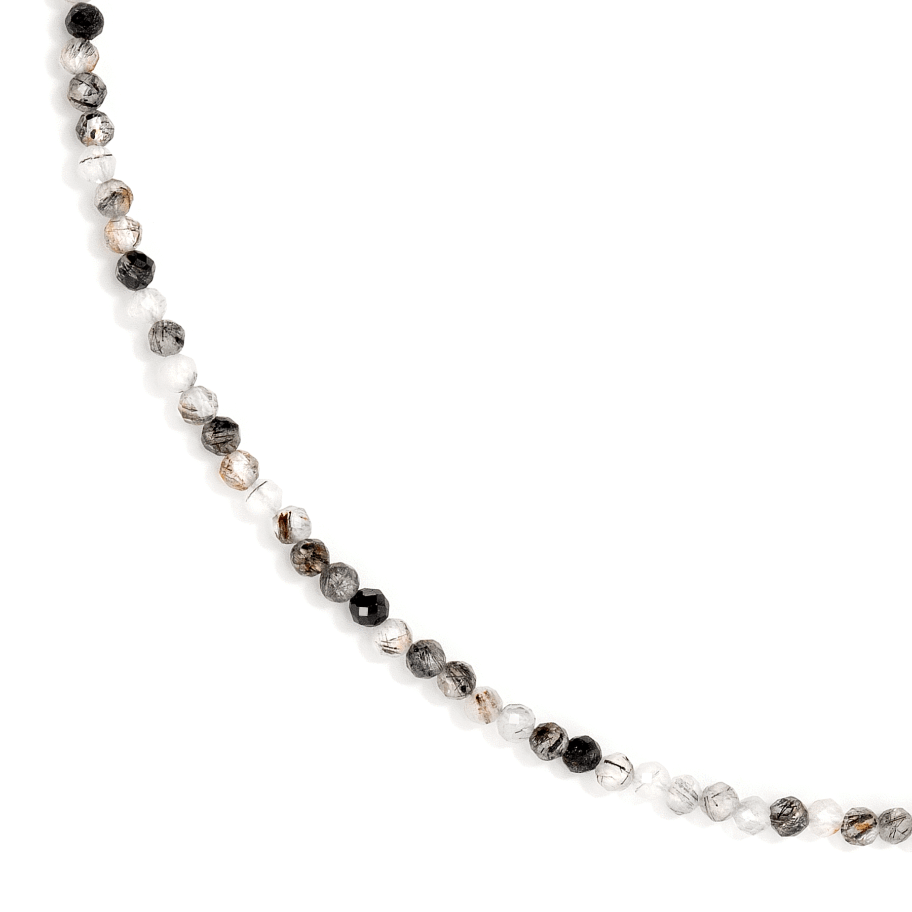 Close up of a rutile quartz stone necklace