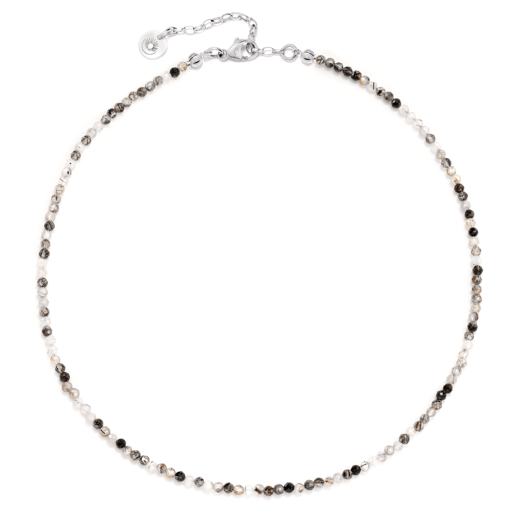 Neck choker made of quartz stones with rutile on a light background