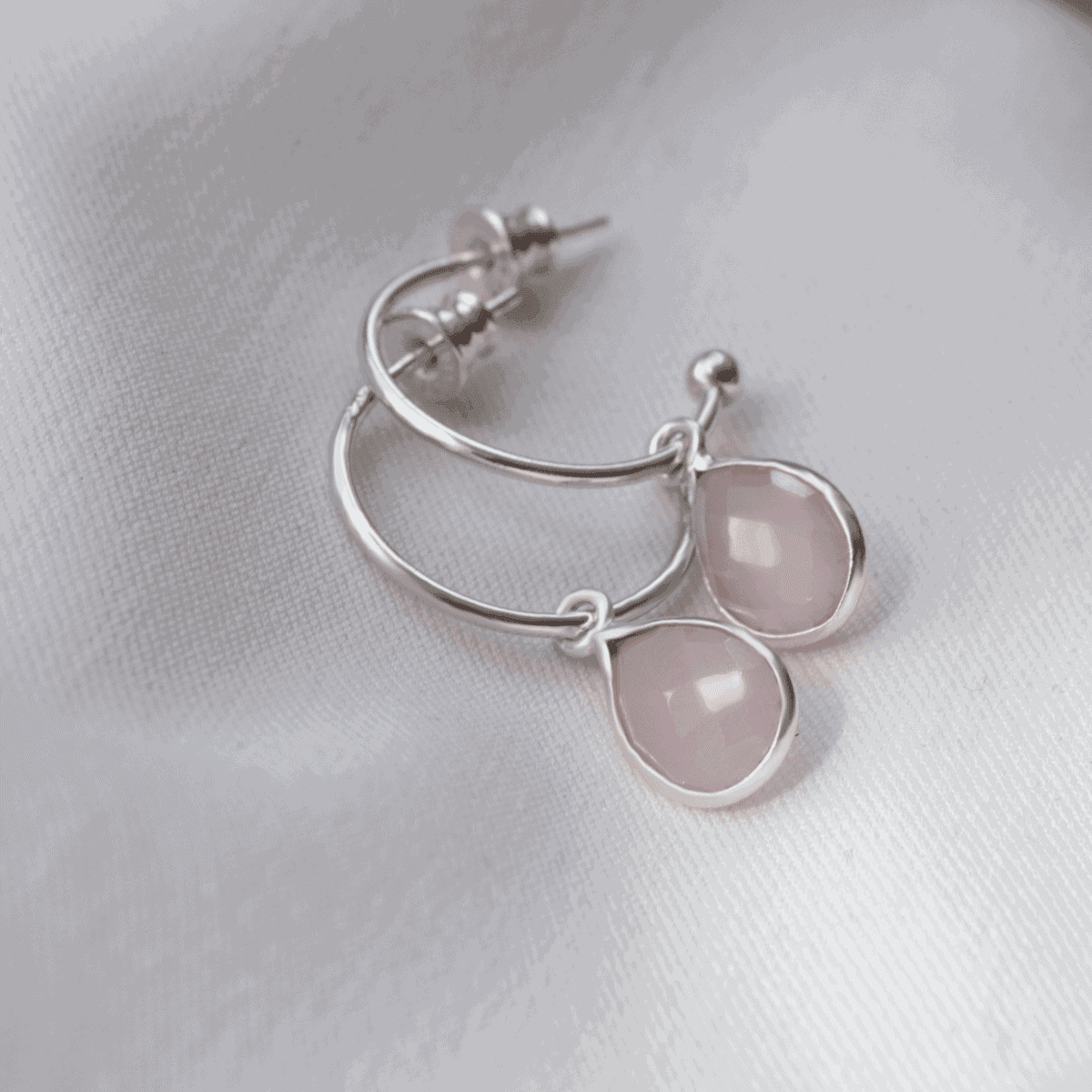 Silver hoop earrings with  pink quartz pendant