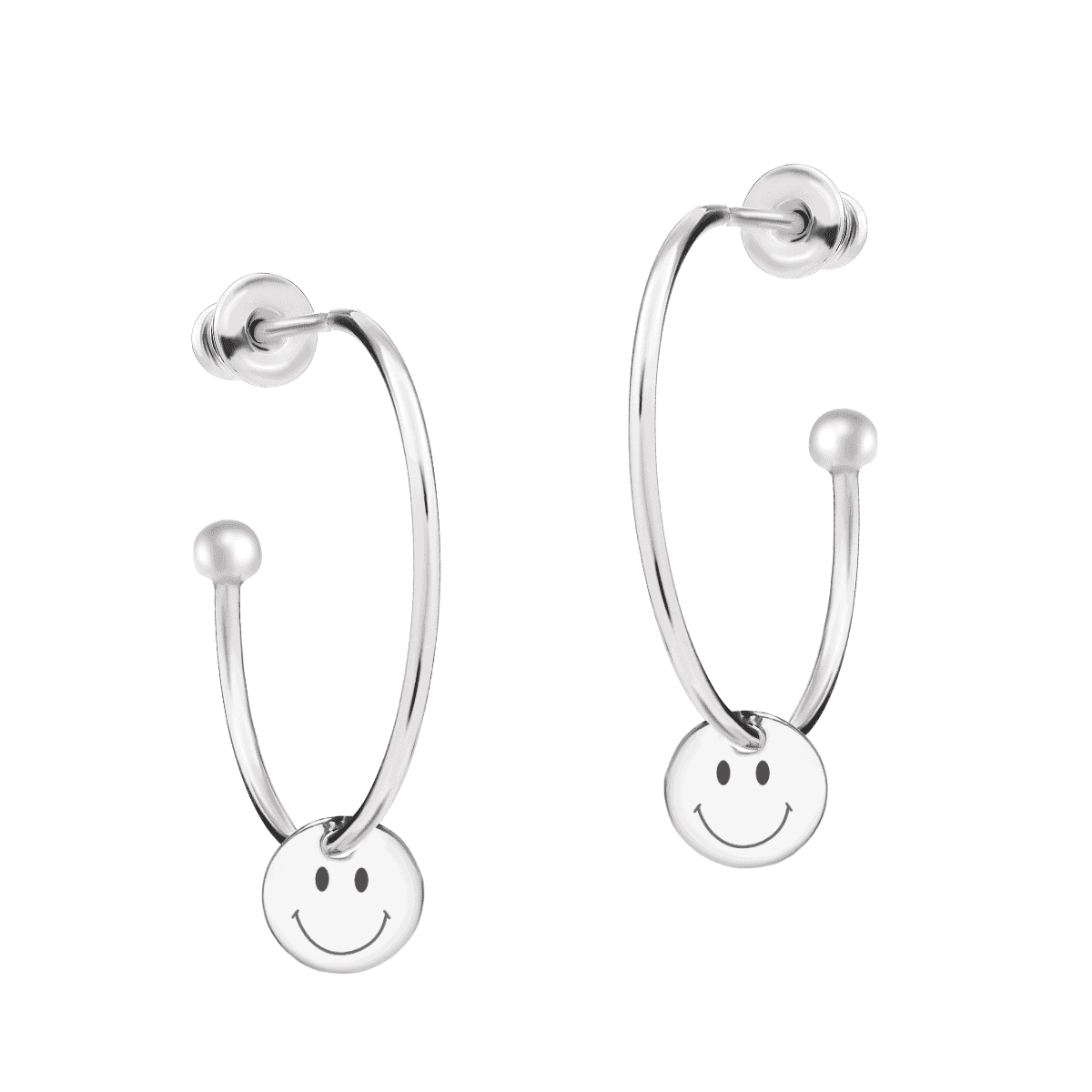 Silver hoop earrings with pendant on a light background