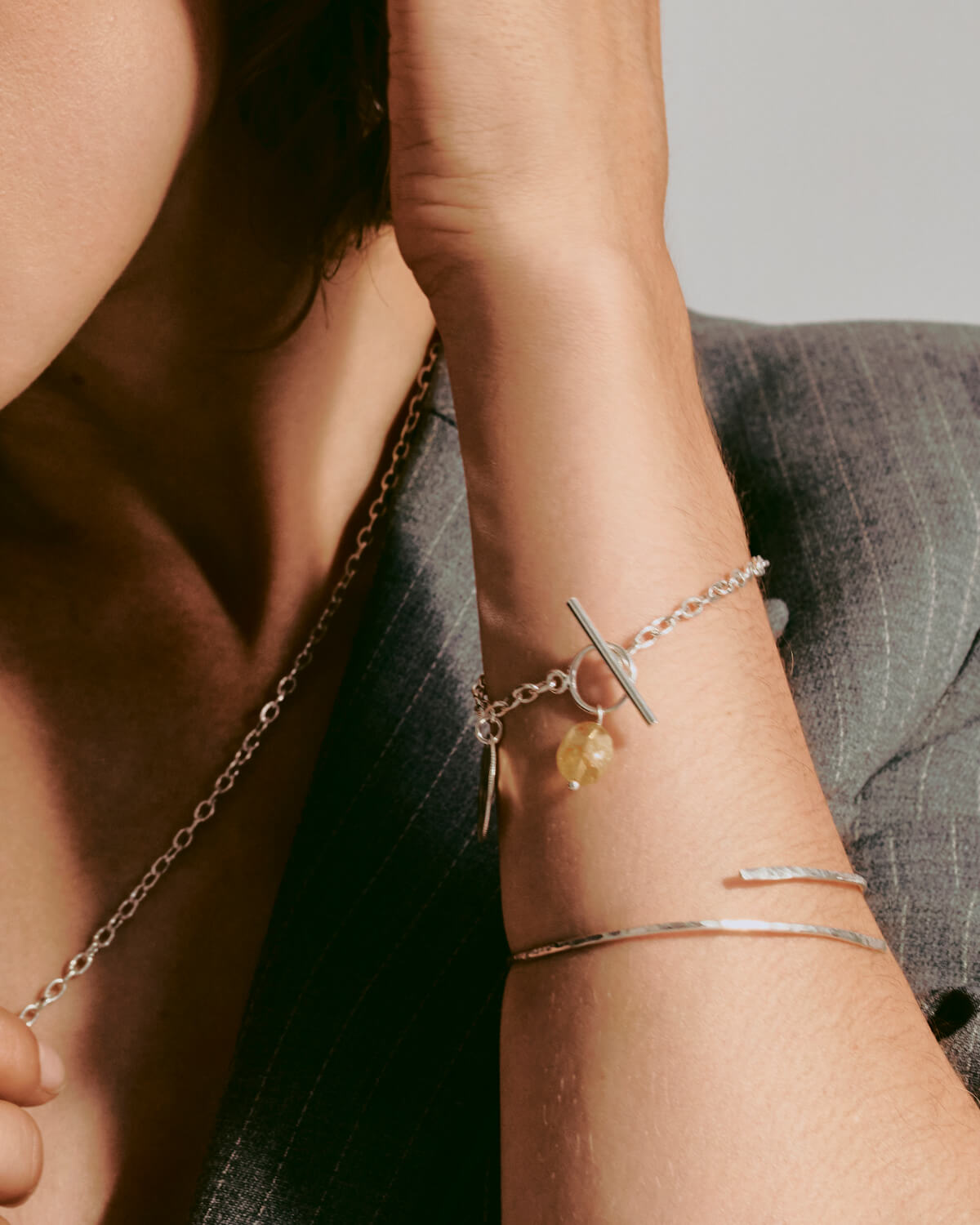 Silver bracelet with citrine on the model