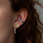 Silver earrings with green gemstone