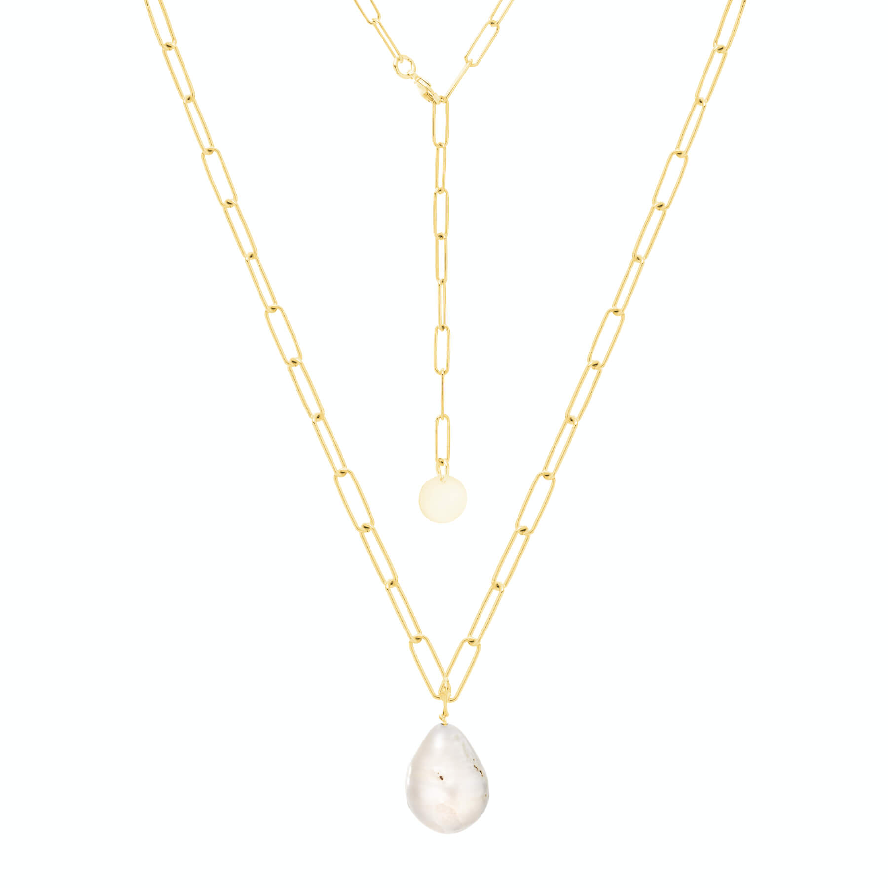 Pozłacany naszyjnik z perłą barokową na janym tle